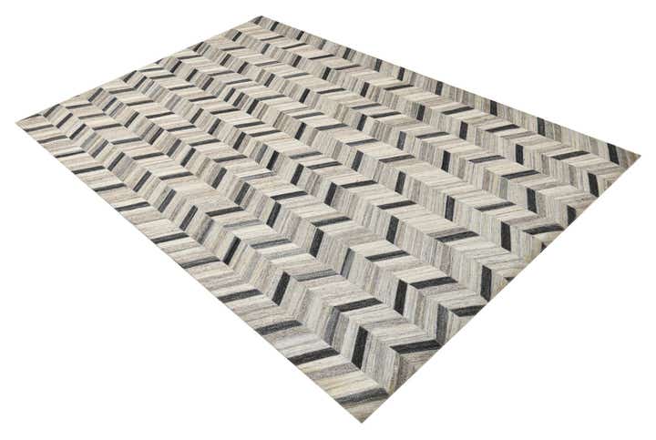 5' 4 x 8' 1 Cowhide Rug