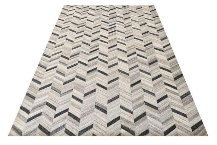 5' 4 x 8' 1 Cowhide Rug