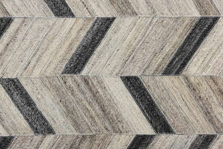 5' 4 x 8' 1 Cowhide Rug