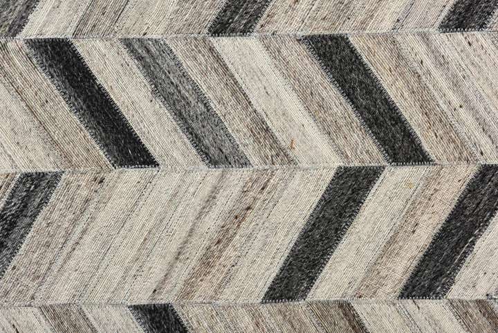 5' 4 x 8' 1 Cowhide Rug