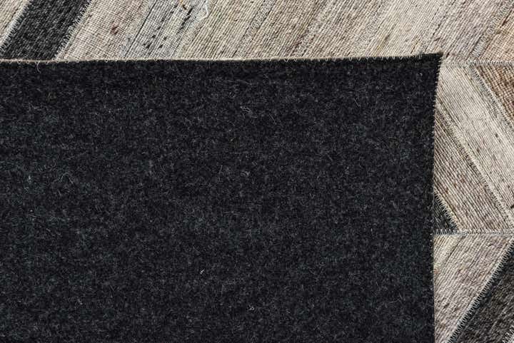 5' 4 x 8' 1 Cowhide Rug