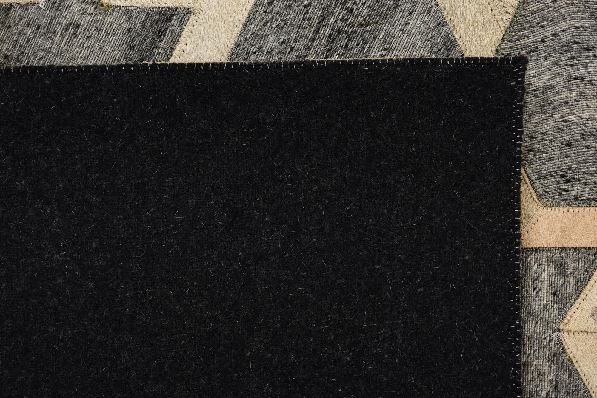 5' x 7' 9 Cowhide Rug