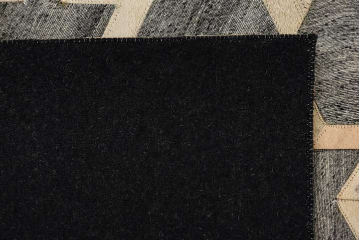 5' x 7' 9 Cowhide Rug