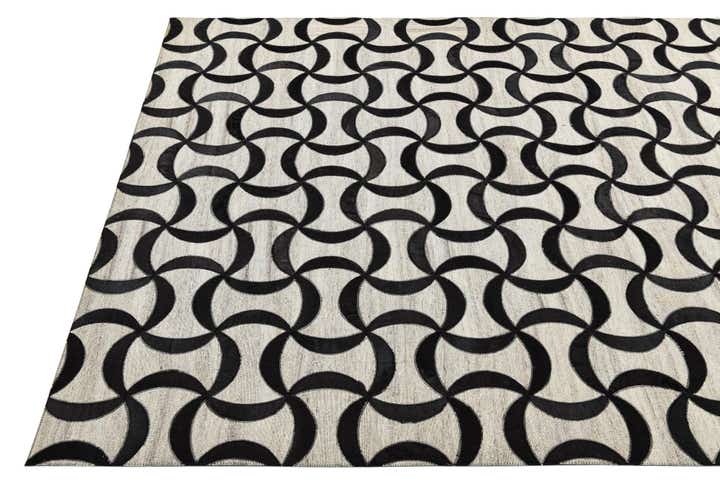5' x 7' 9 Cowhide Rug