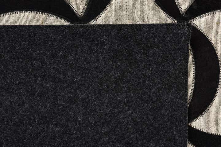 5' x 7' 9 Cowhide Rug