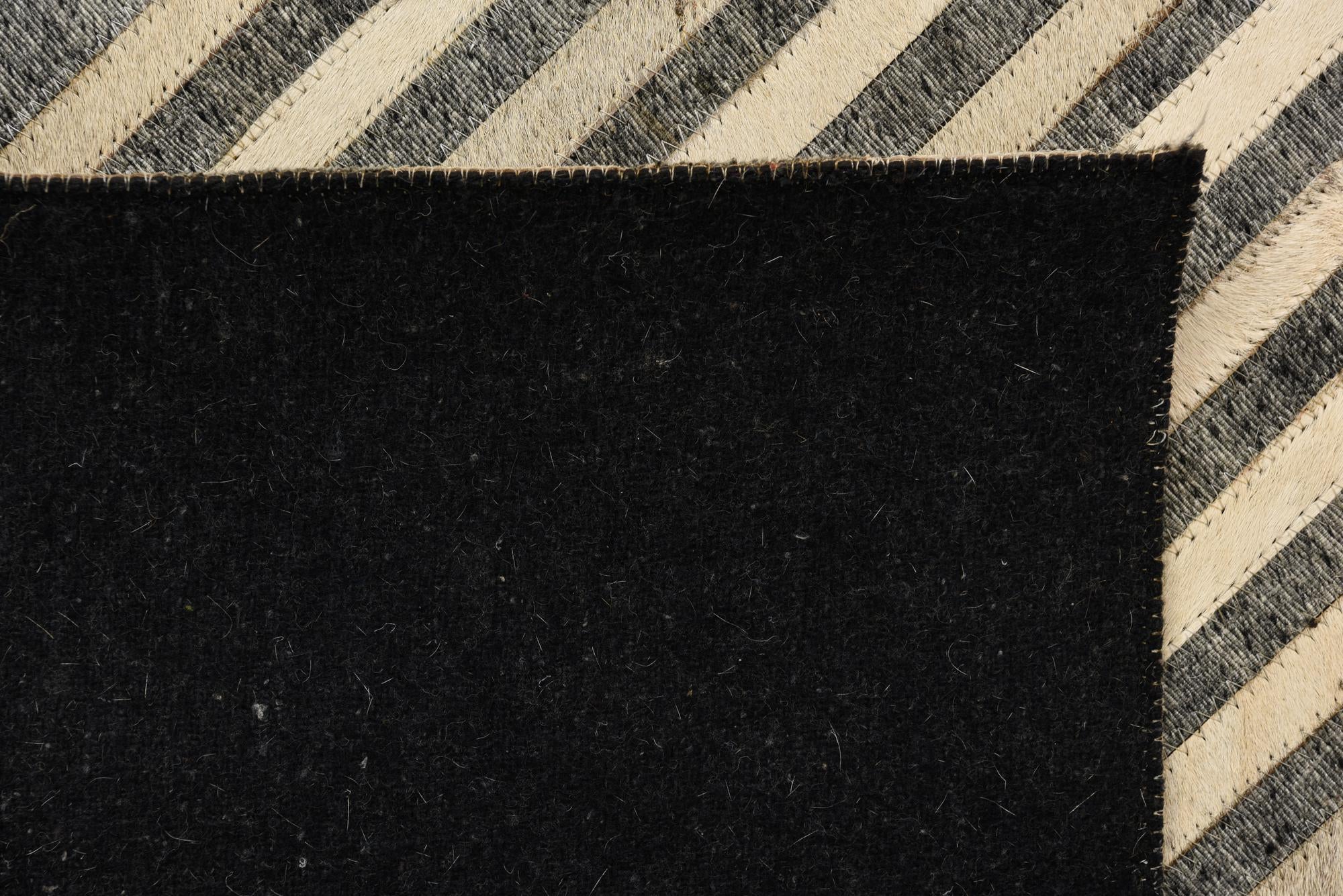 5' 1 x 8' 3 Cowhide Rug