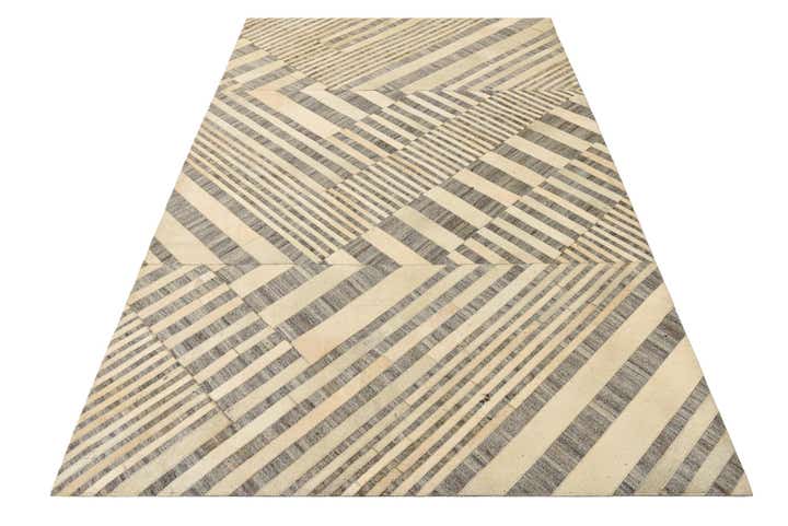 5' 1 x 8' 1 Cowhide Rug