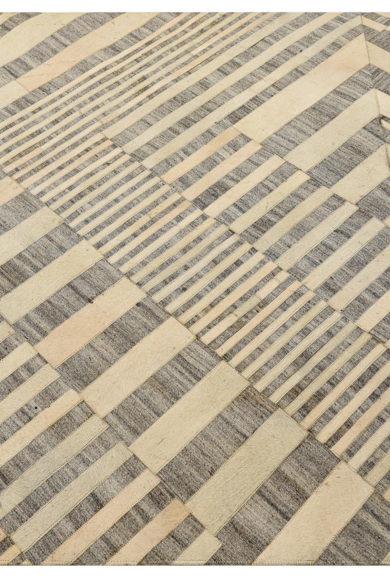 5' 1 x 8' 1 Cowhide Rug