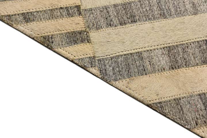 5' 1 x 8' 1 Cowhide Rug