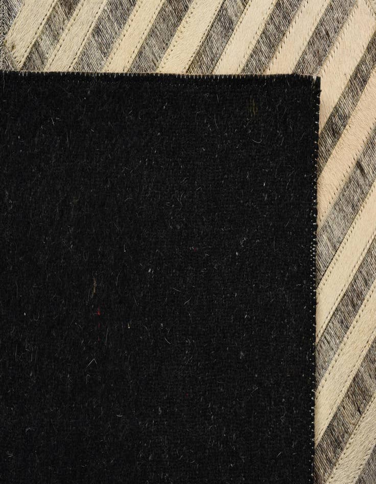 Detail image of 5' 1 x 8' 1 Cowhide Rug