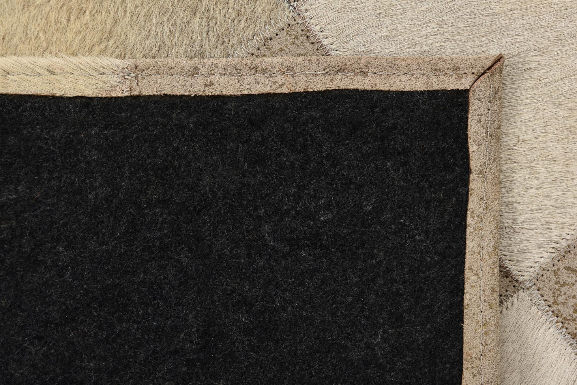 2' 1 x 3' 1 Cowhide Rug