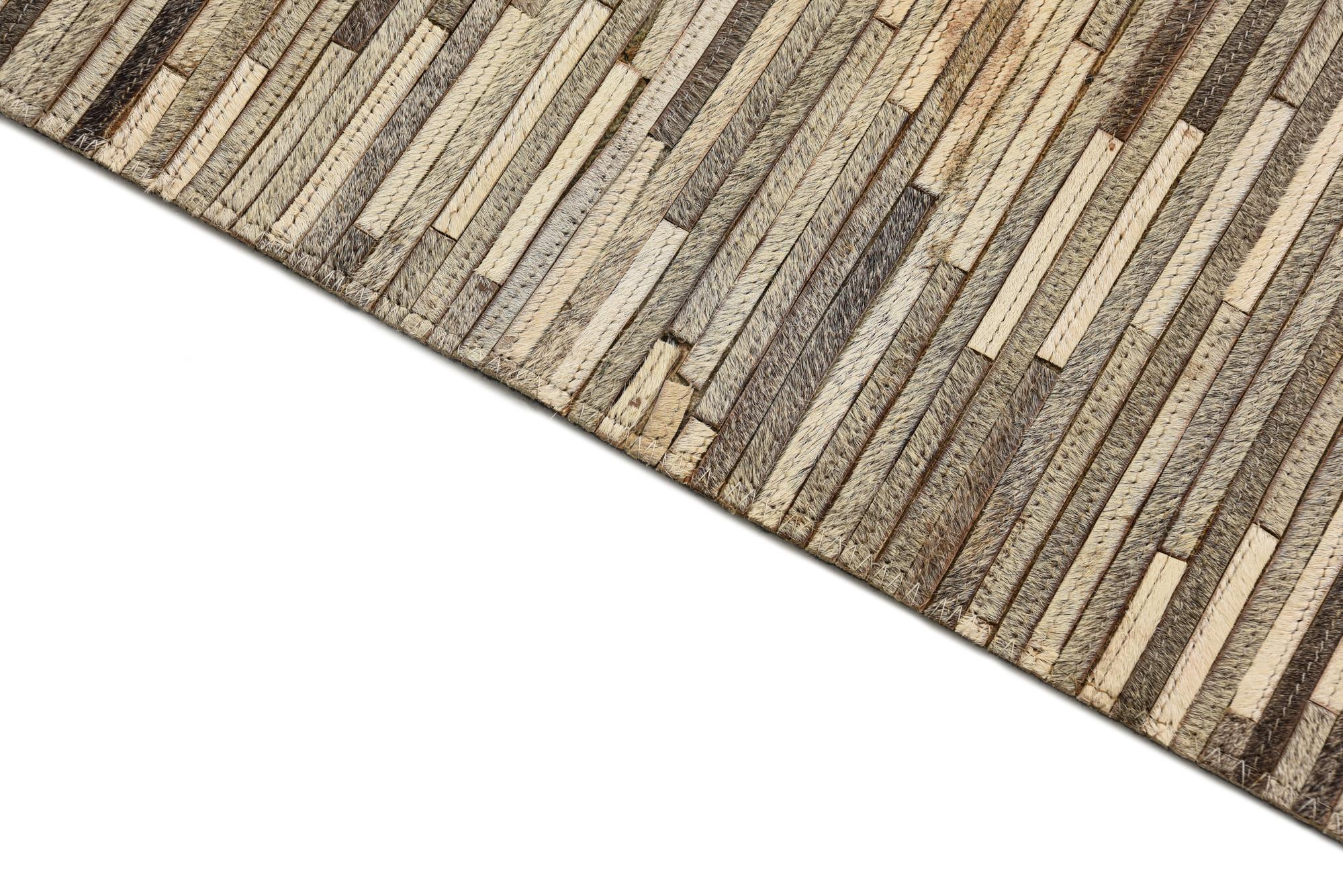 2' 2 x 3' 3 Cowhide Rug