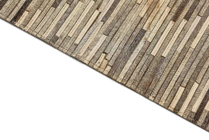 2' 2 x 3' 3 Cowhide Rug