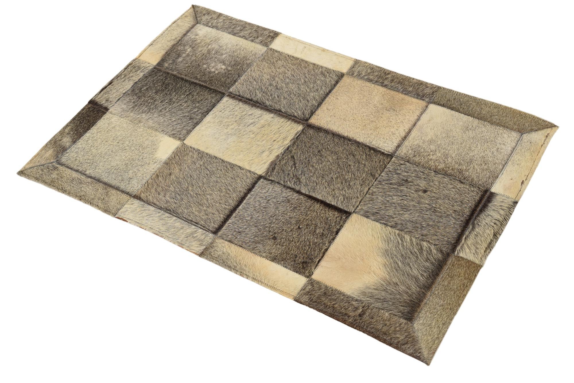 2' 1 x 3' 1 Cowhide Rug