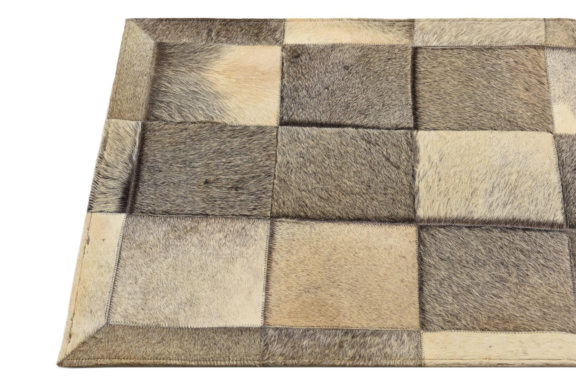 2' 1 x 3' 1 Cowhide Rug