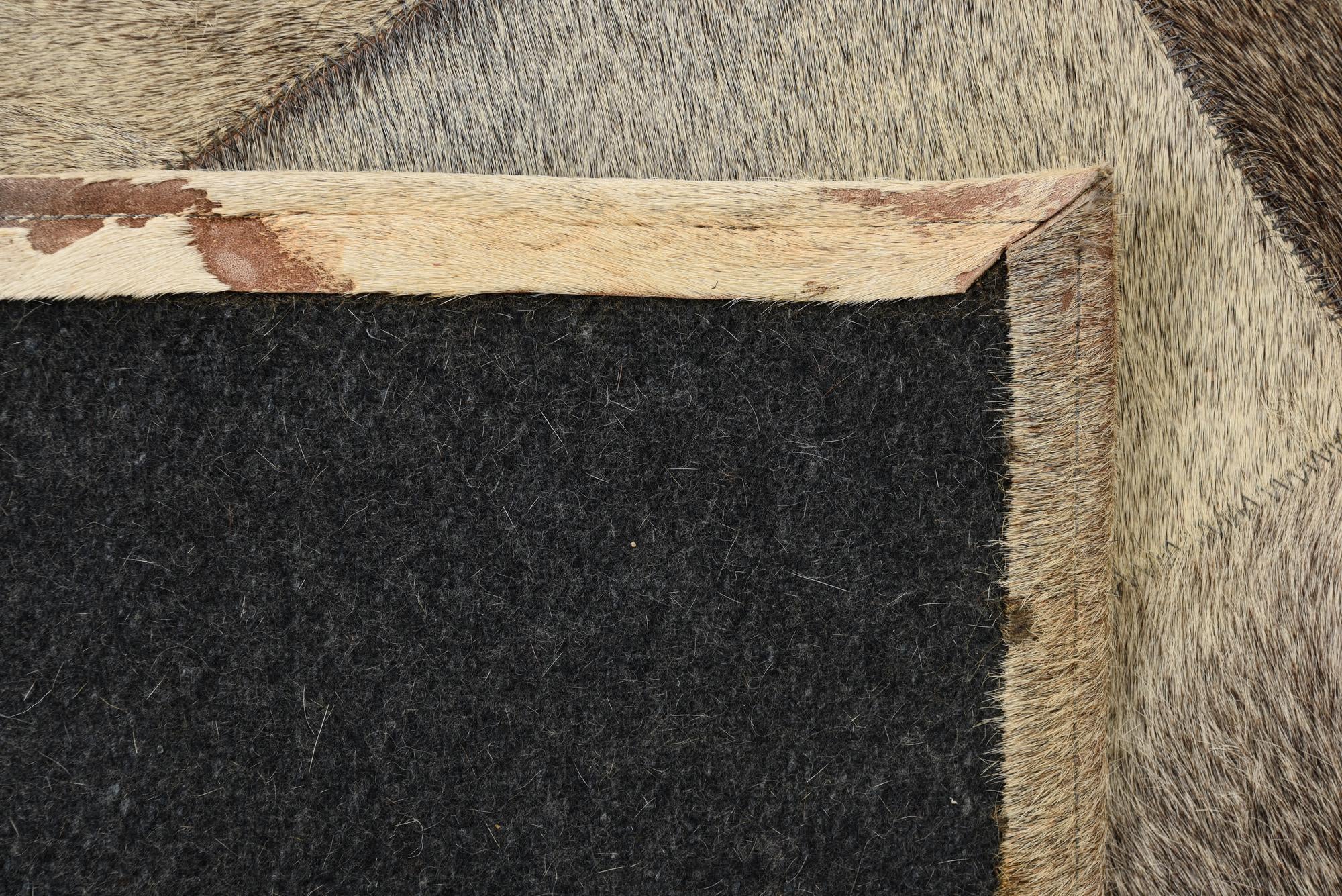 2' 1 x 3' 1 Cowhide Rug