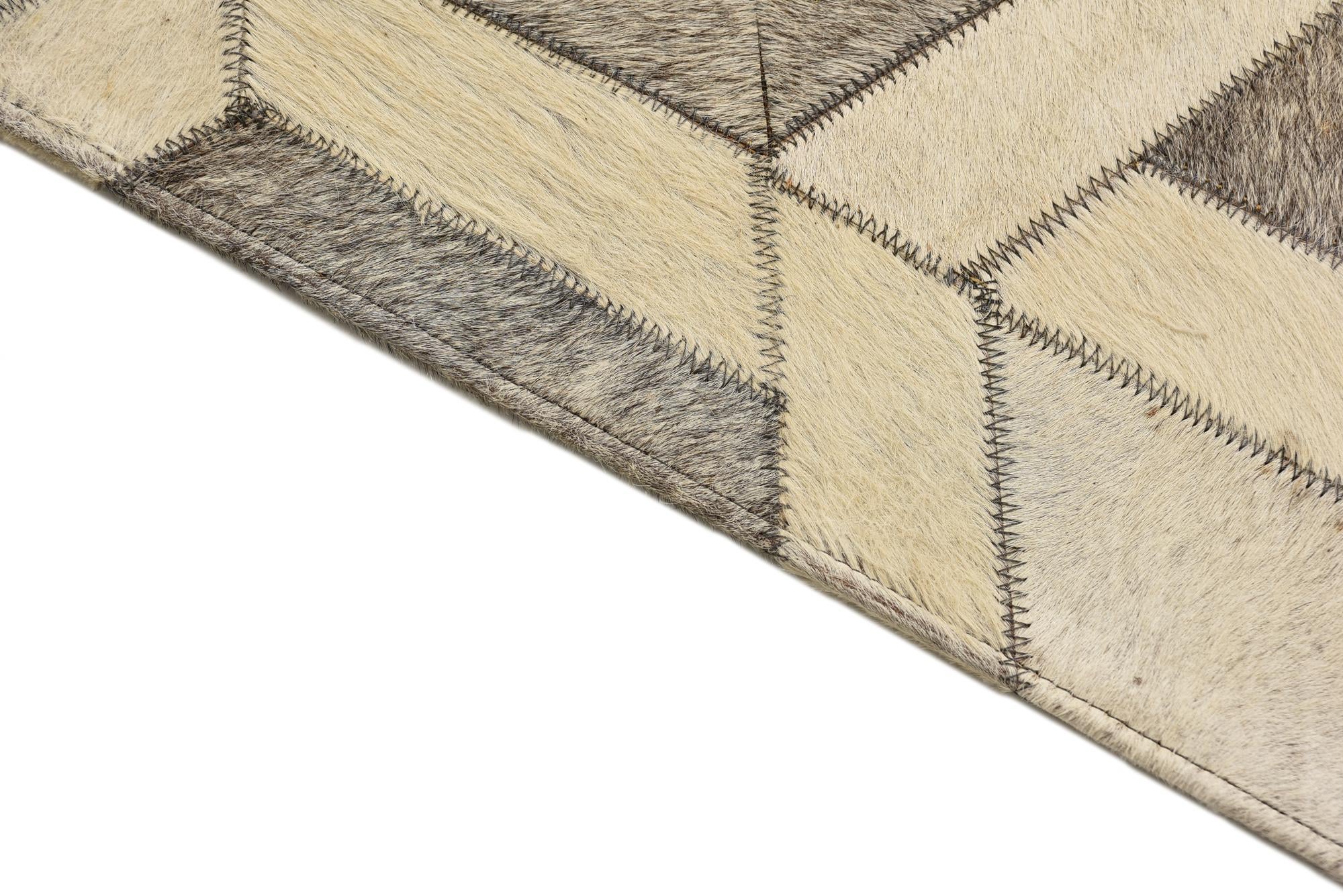 2' 1 x 3' 1 Cowhide Rug