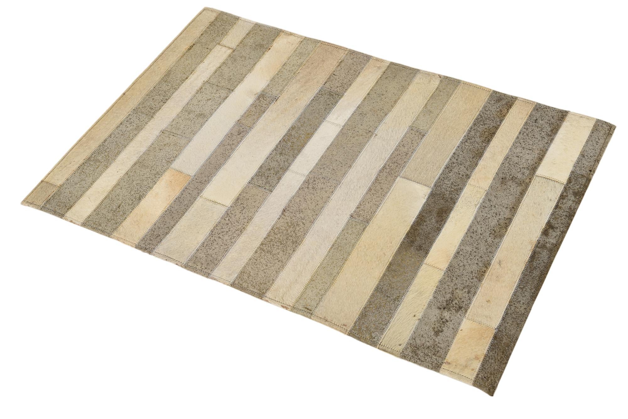 2' 1 x 3' Cowhide Rug