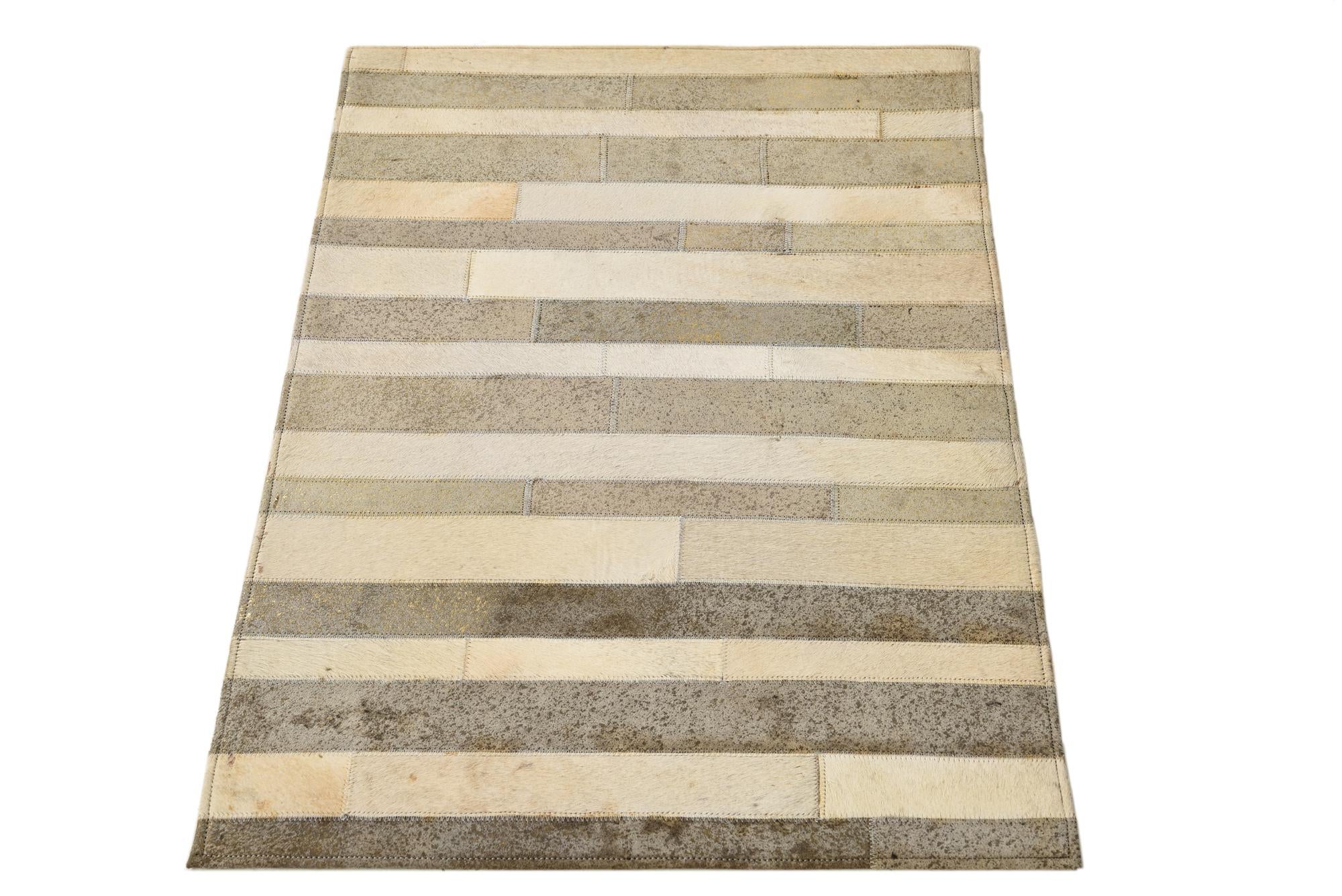 2' 1 x 3' Cowhide Rug