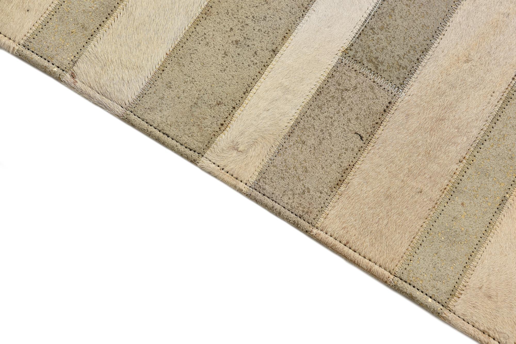 2' 1 x 3' Cowhide Rug