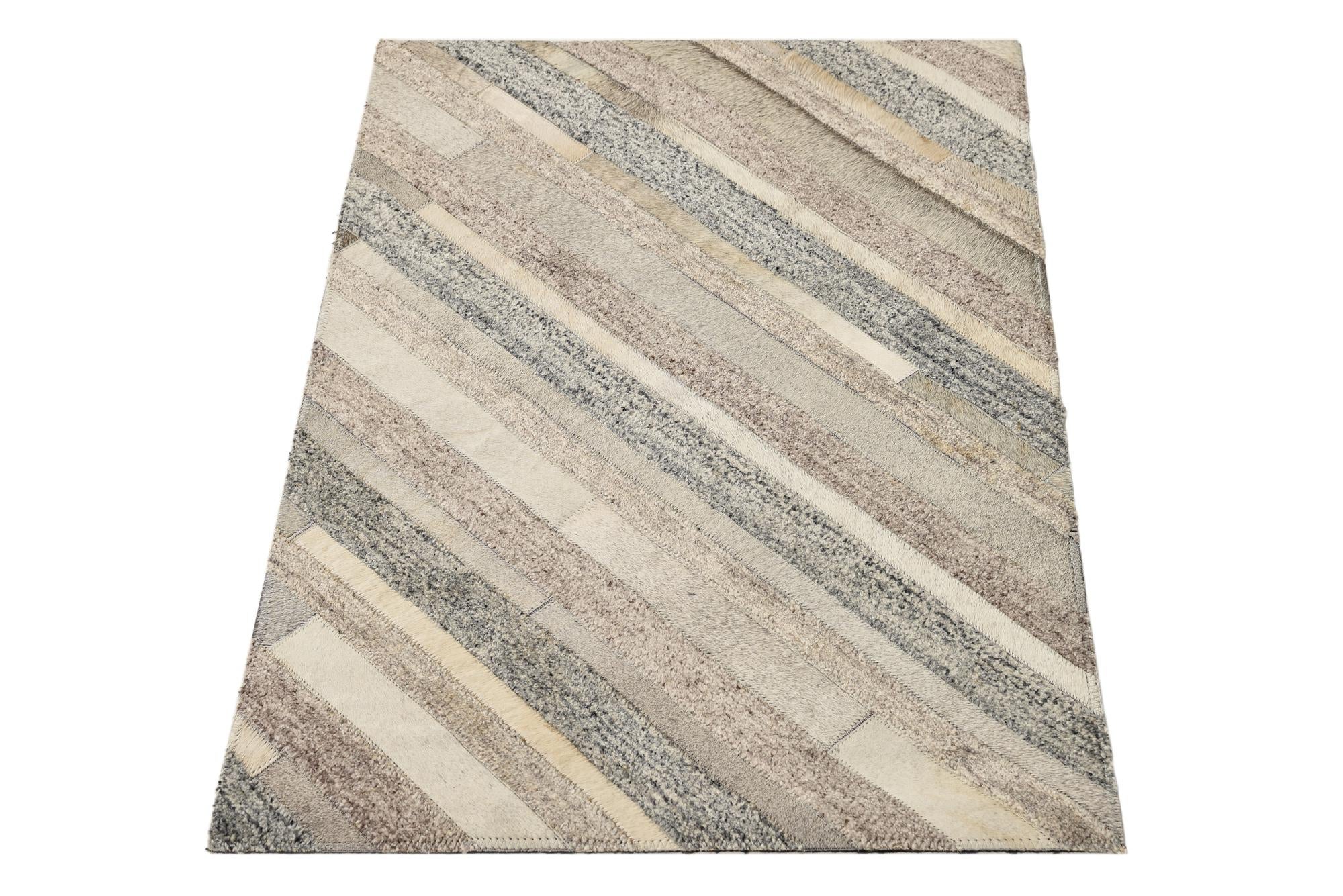 2' 1 x 3' Cowhide Rug