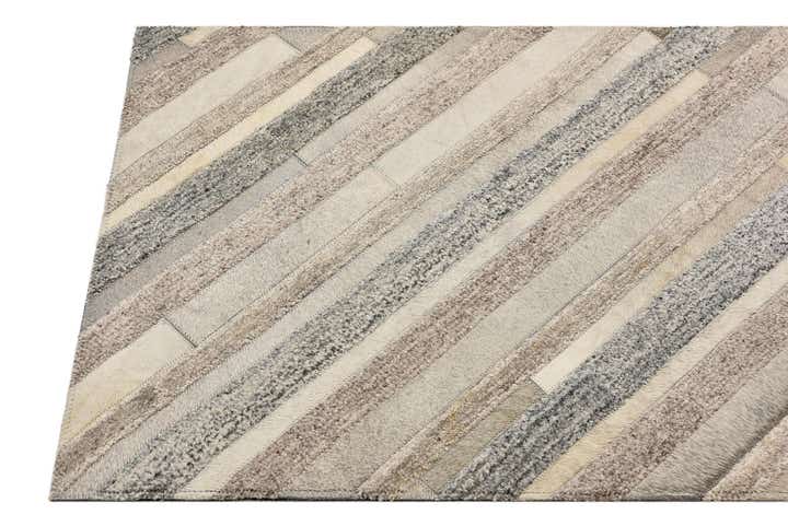 2' 1 x 3' Cowhide Rug