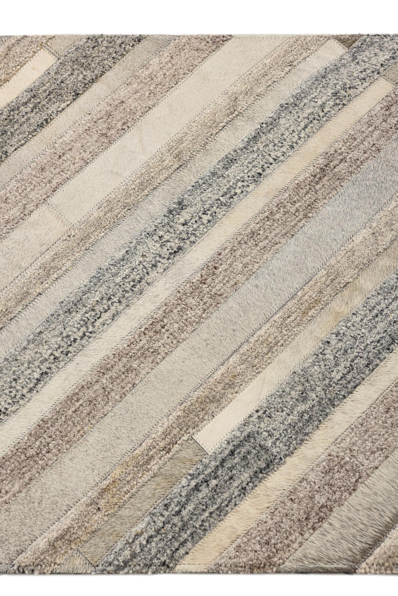 2' 1 x 3' Cowhide Rug
