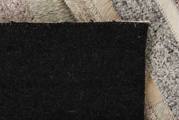 2' 1 x 3' Cowhide Rug