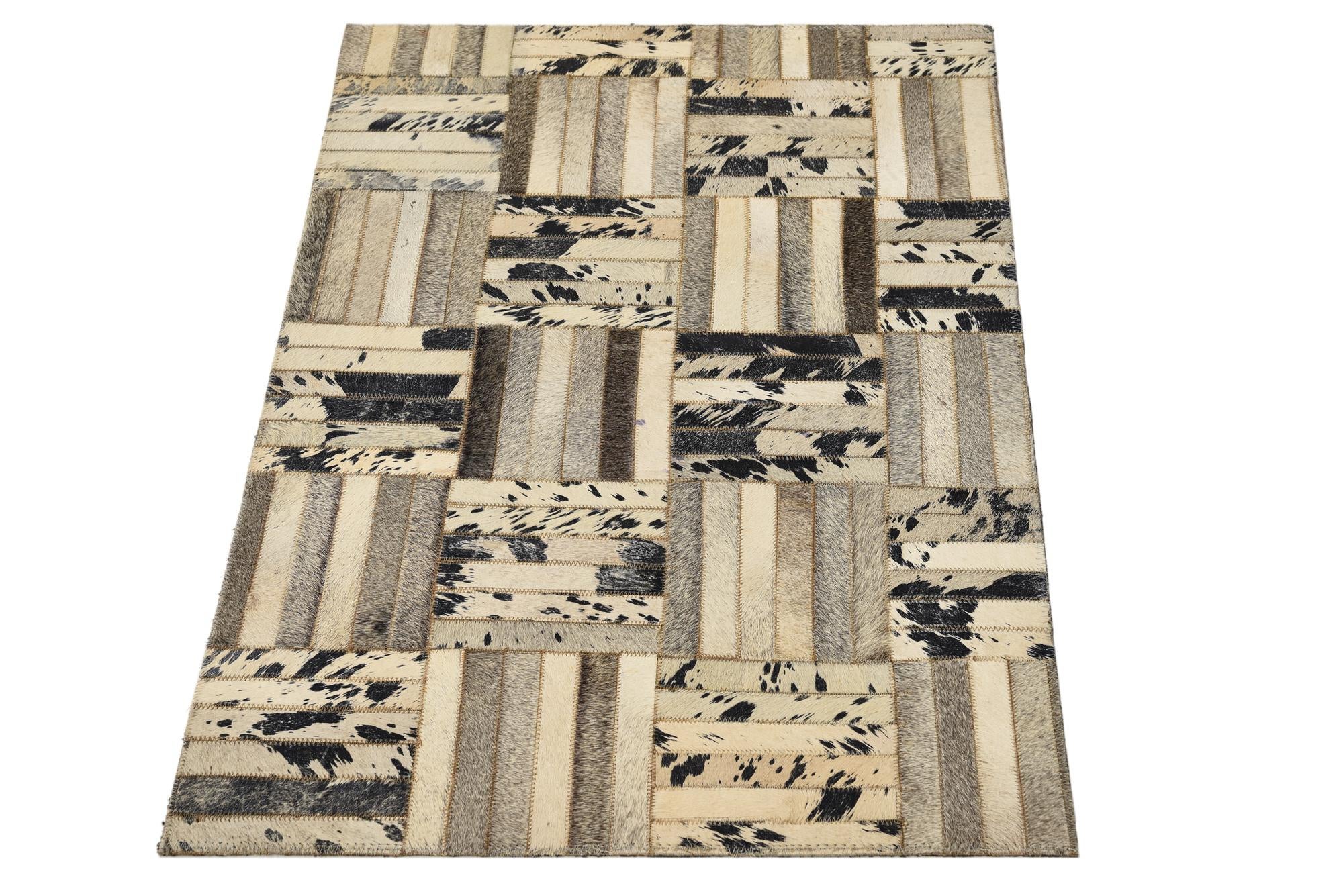2' 1 x 3' 1 Cowhide Rug