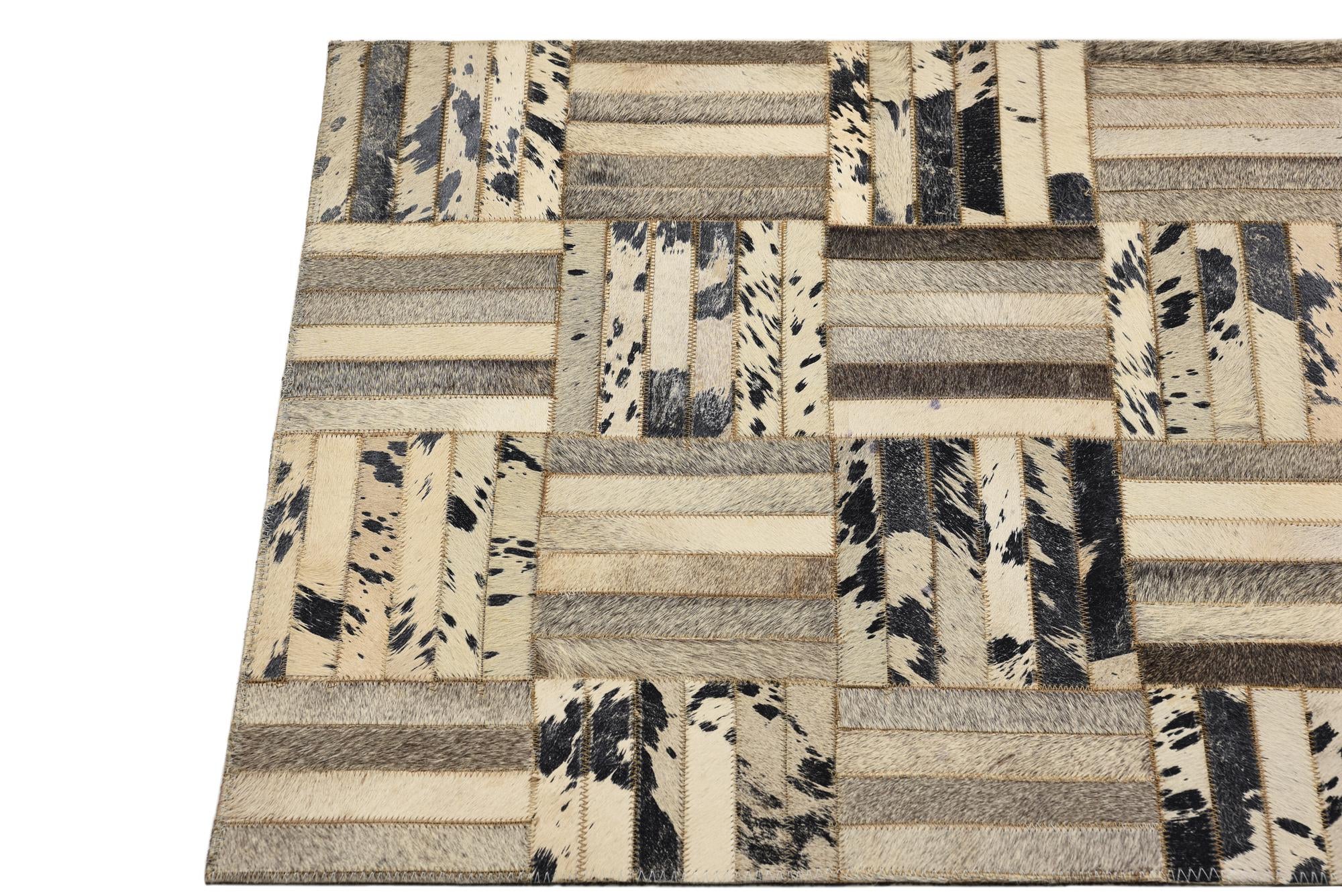 2' 1 x 3' 1 Cowhide Rug