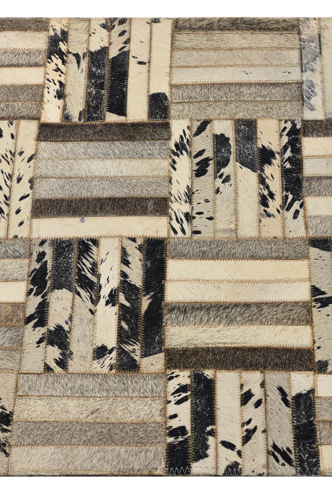2' 1 x 3' 1 Cowhide Rug
