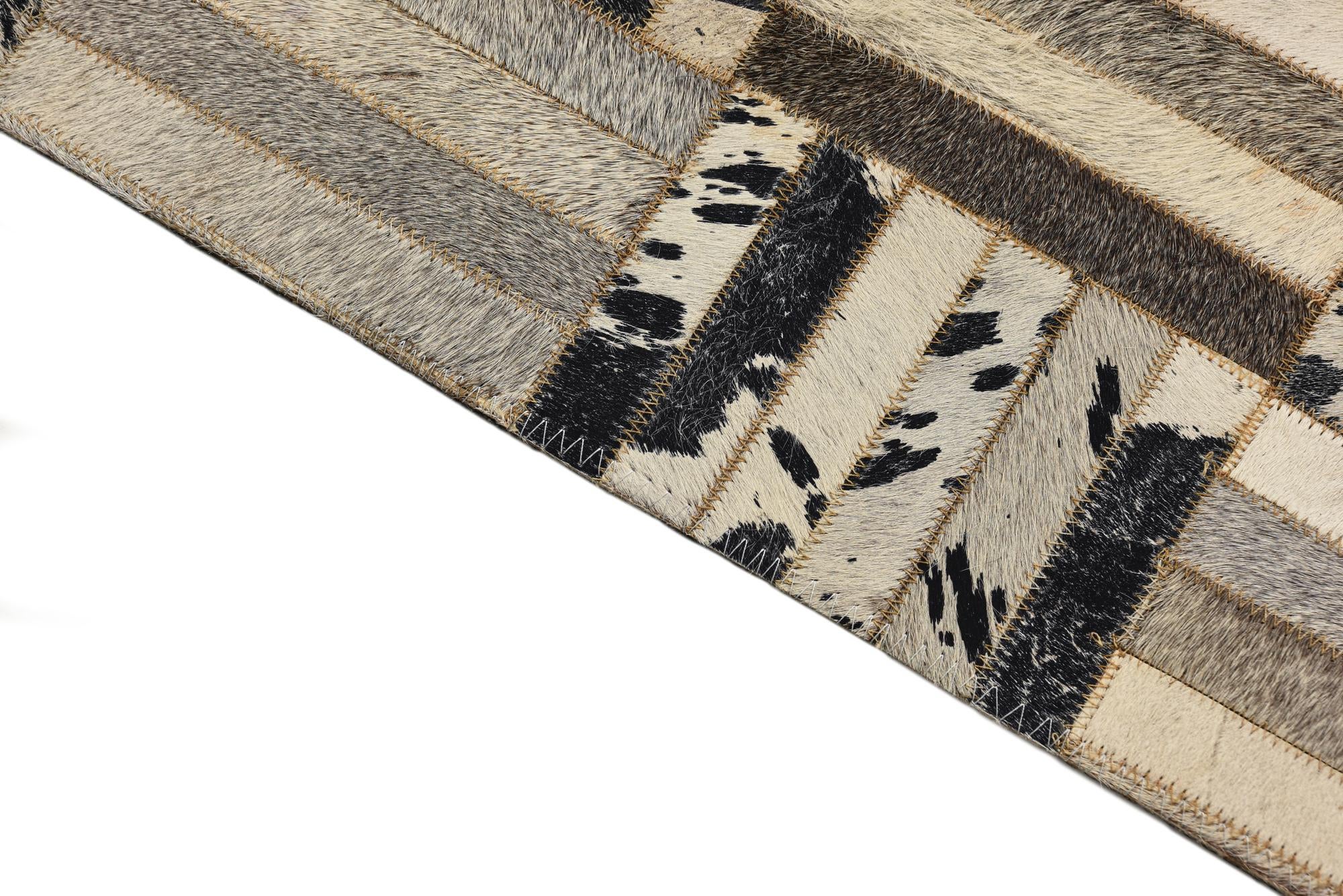 2' 1 x 3' 1 Cowhide Rug