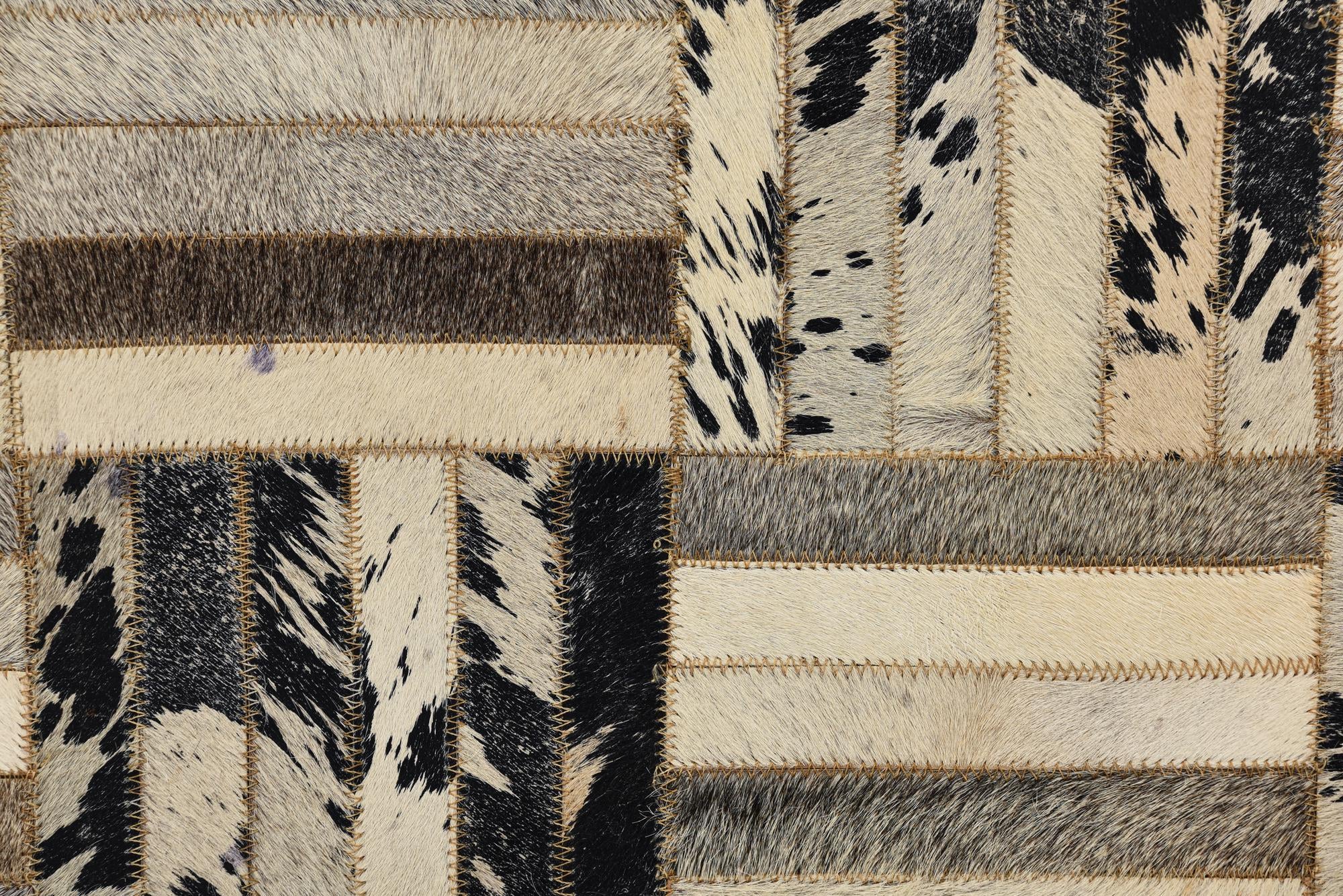 2' 1 x 3' 1 Cowhide Rug