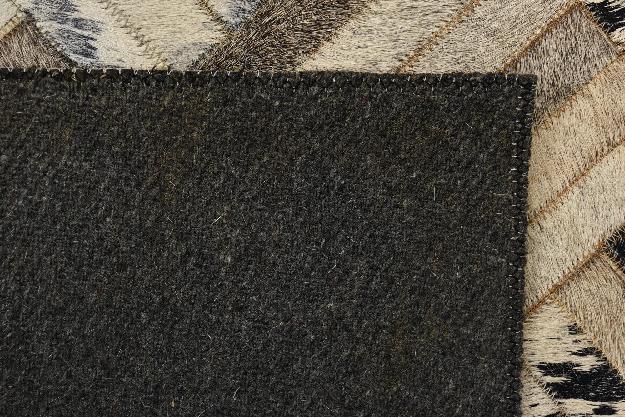 2' 1 x 3' 1 Cowhide Rug