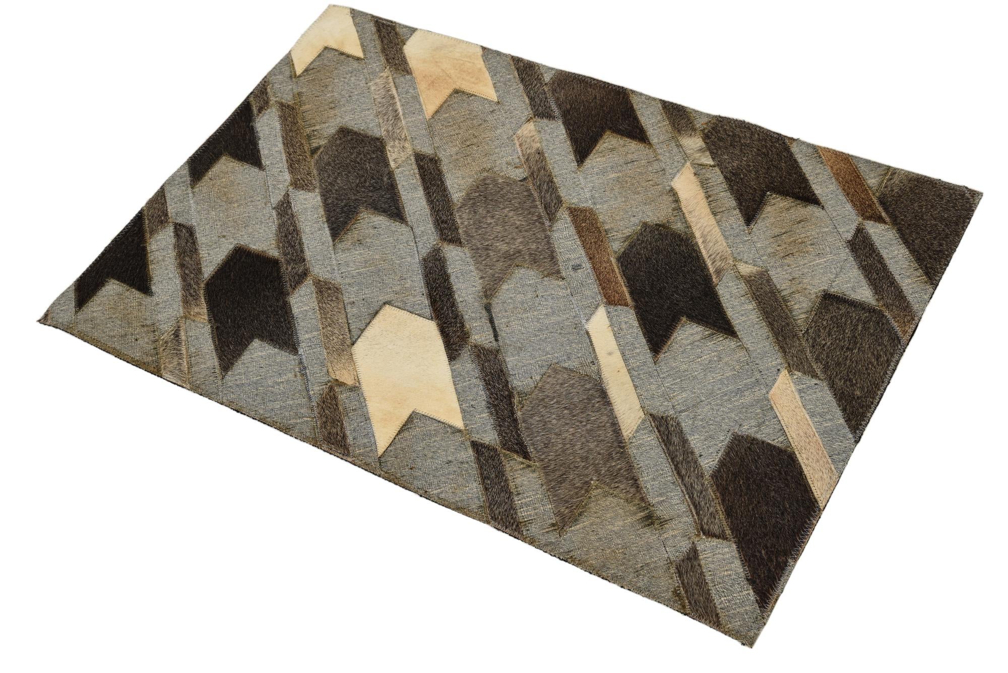 2' 1 x 3' Cowhide Rug