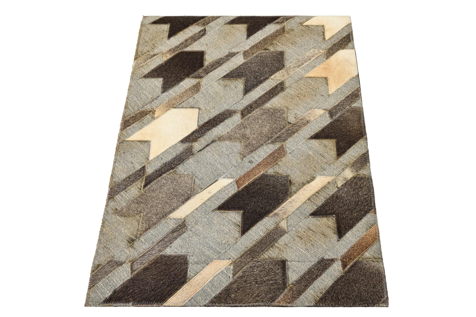 2' 1 x 3' Cowhide Rug