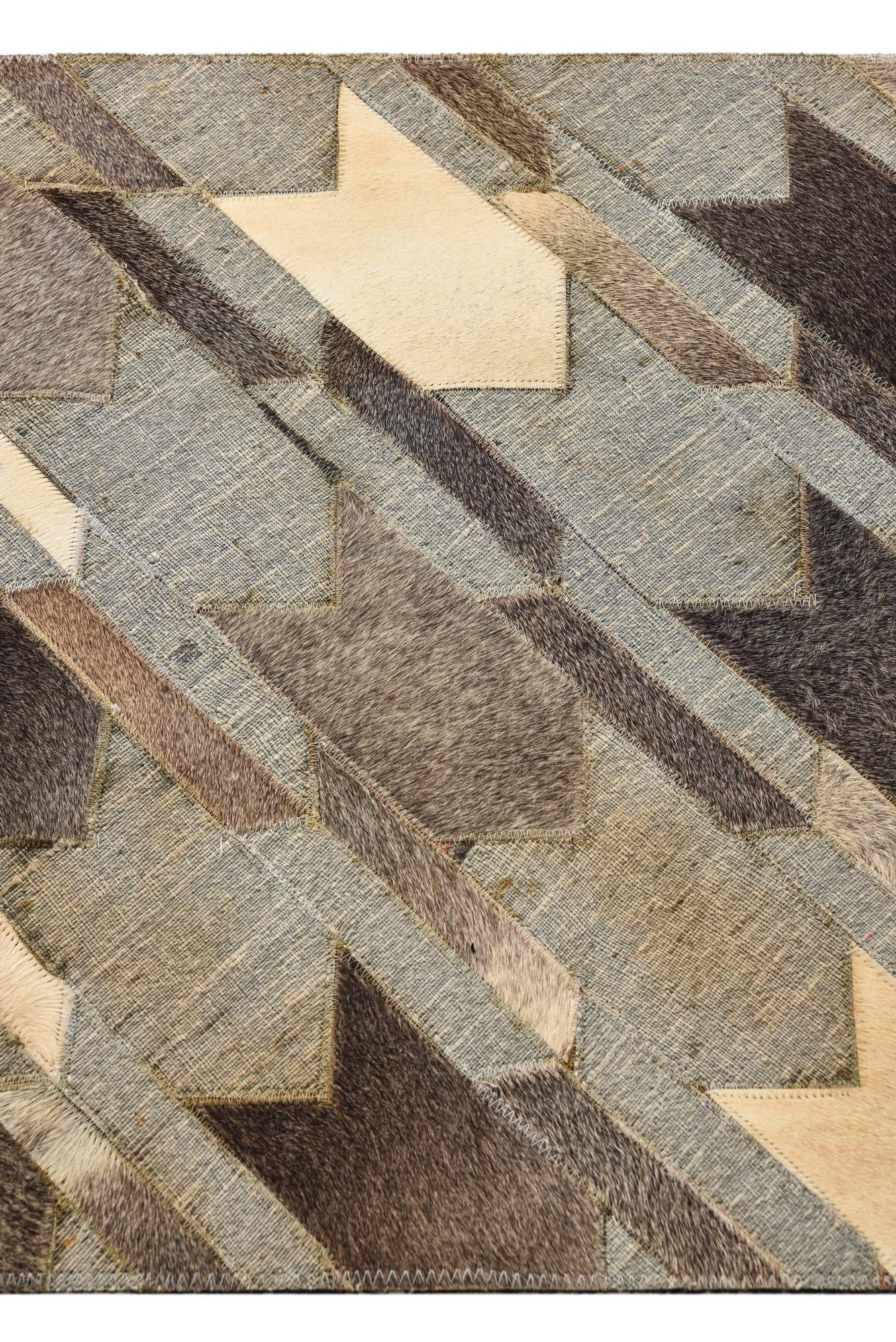 2' 1 x 3' Cowhide Rug