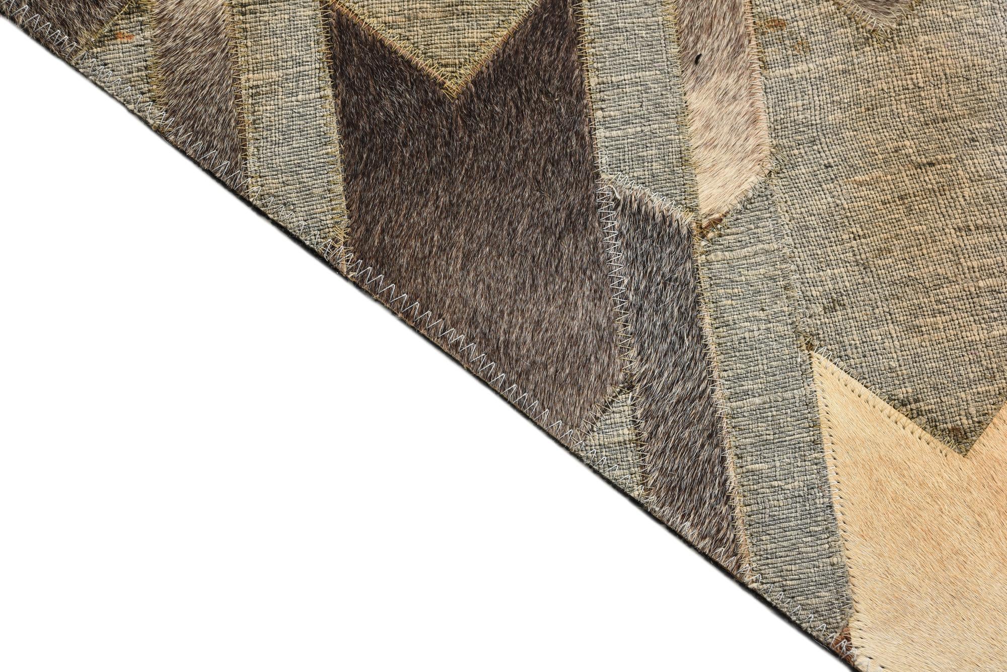 2' 1 x 3' Cowhide Rug