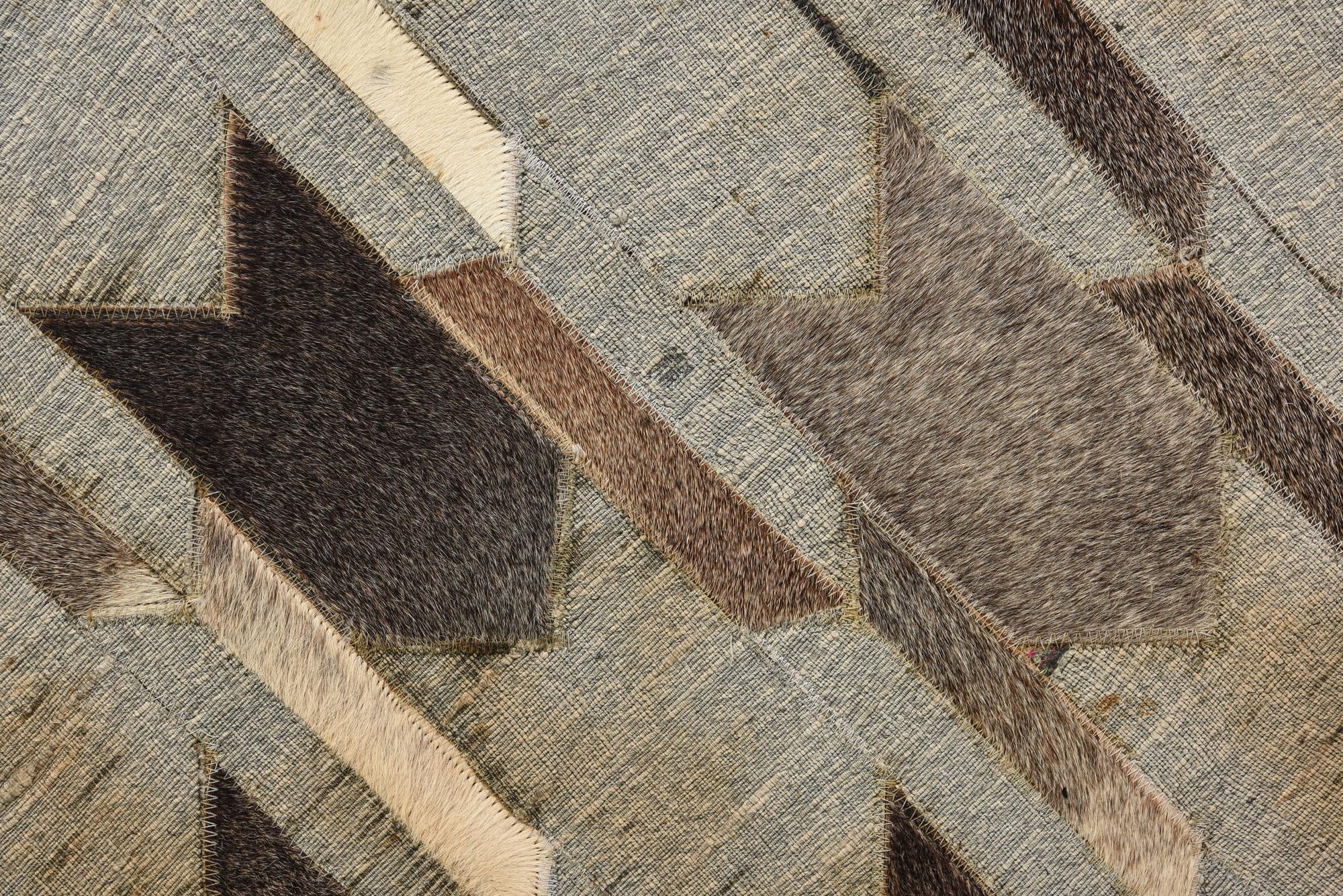 2' 1 x 3' Cowhide Rug