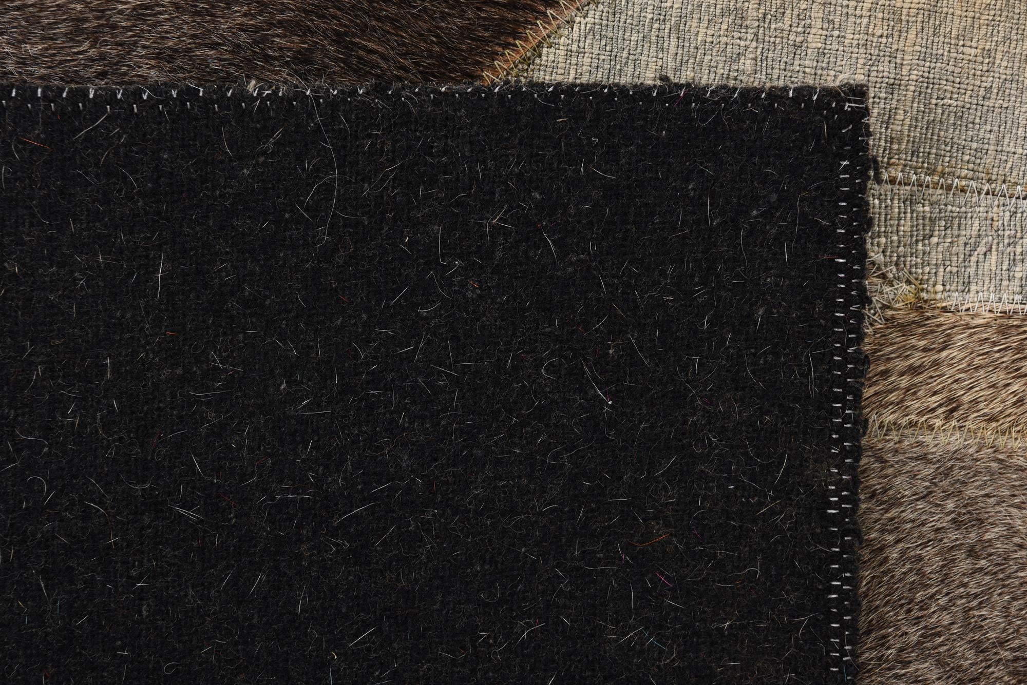 2' 1 x 3' Cowhide Rug