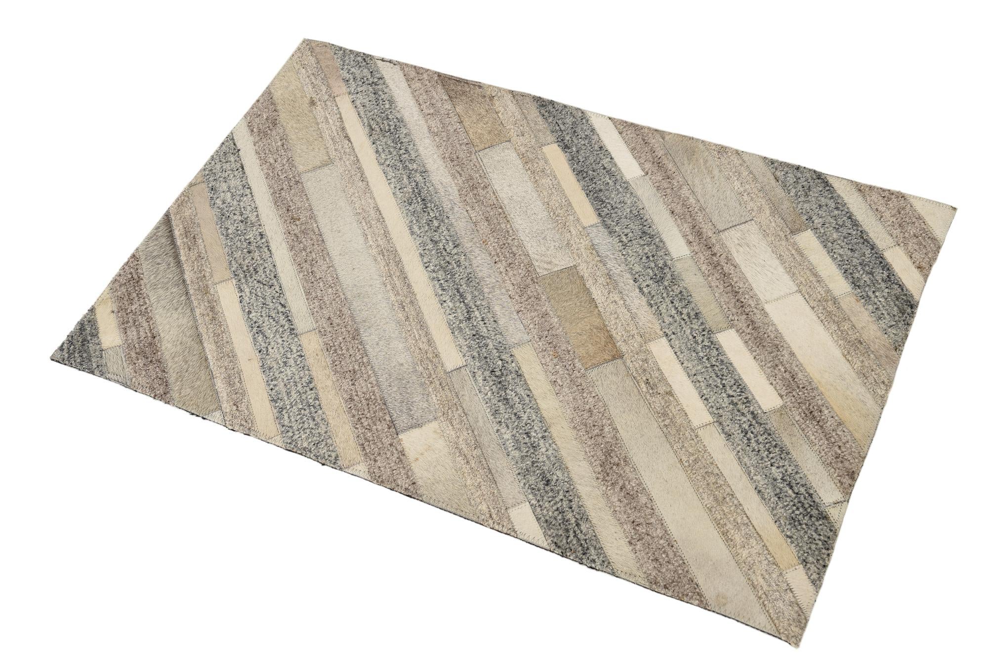 2' 1 x 3' 1 Cowhide Rug