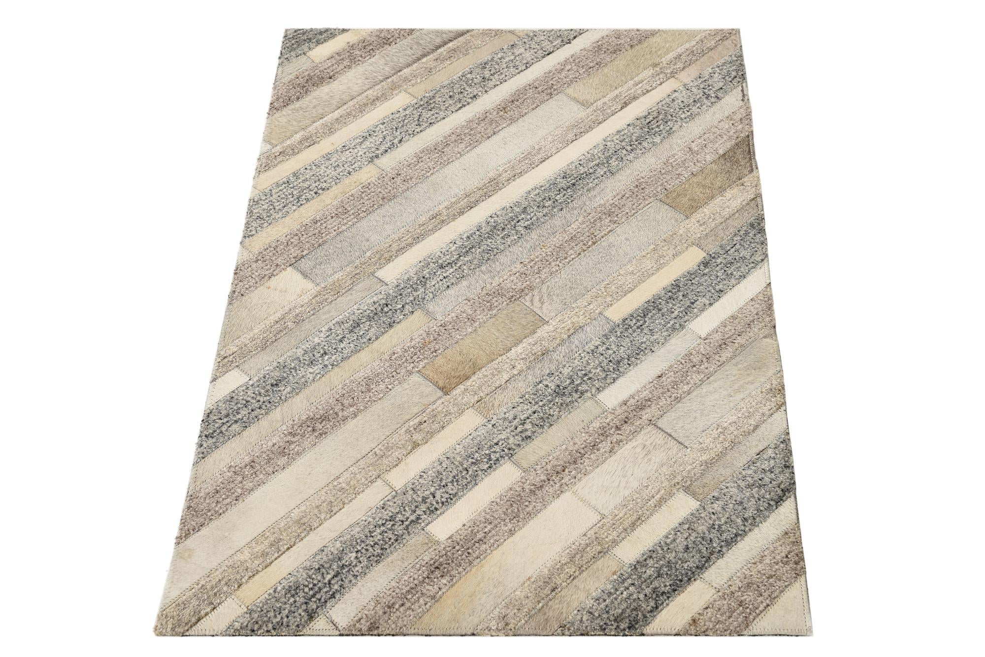 2' 1 x 3' 1 Cowhide Rug