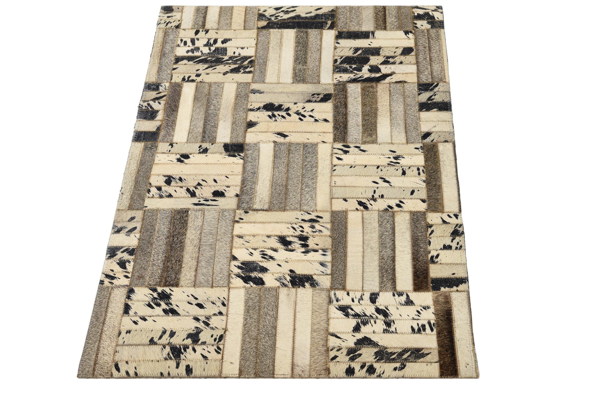 2' 1 x 3' 1 Cowhide Rug