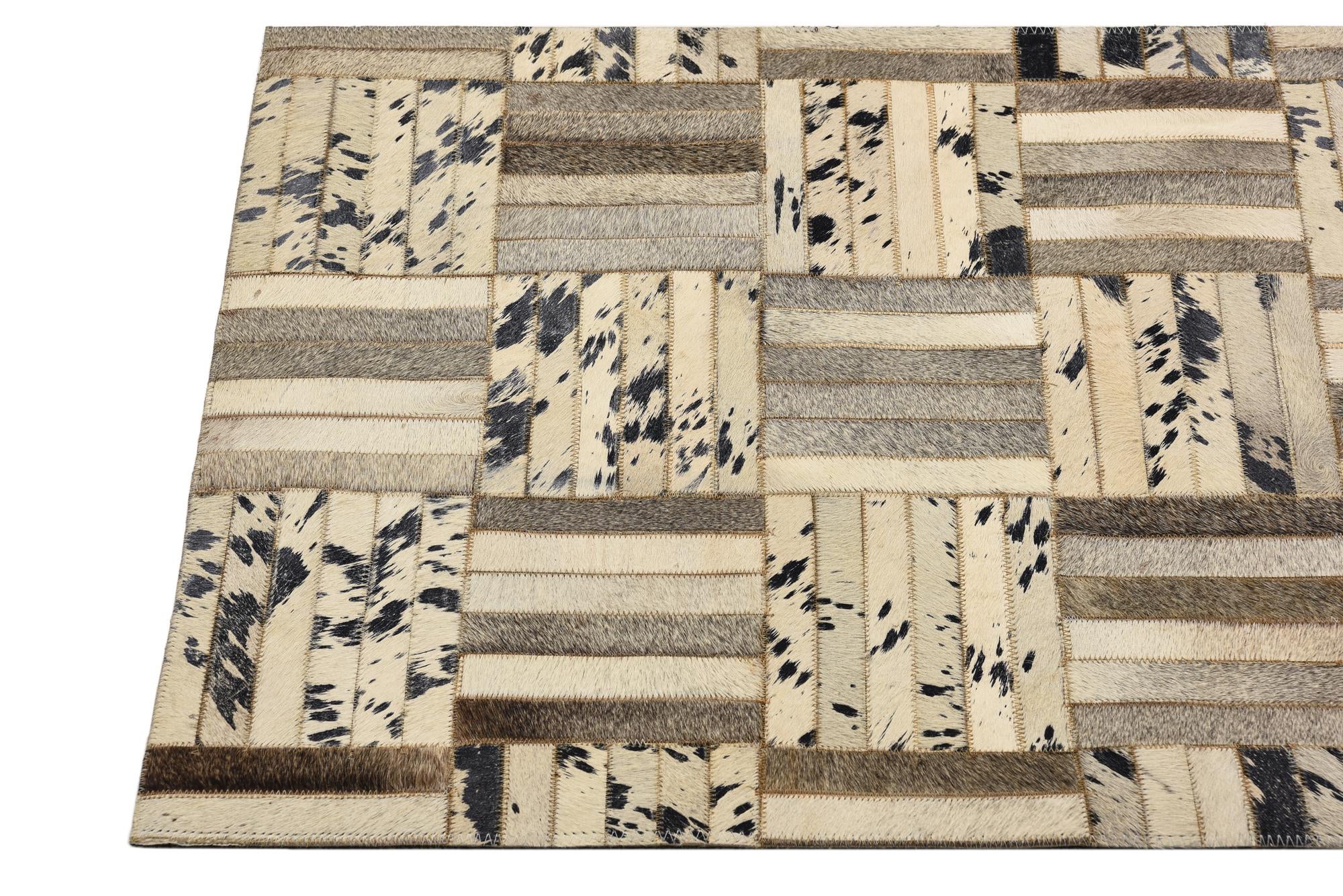 2' 1 x 3' 1 Cowhide Rug