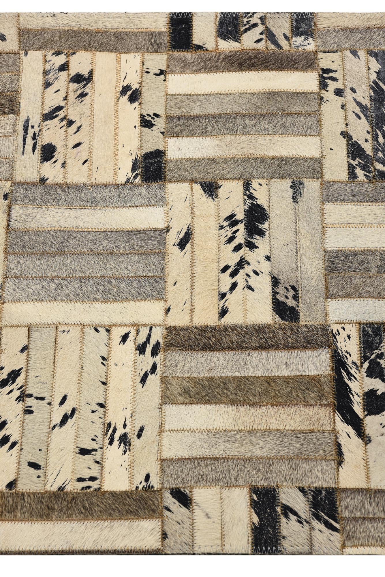 2' 1 x 3' 1 Cowhide Rug