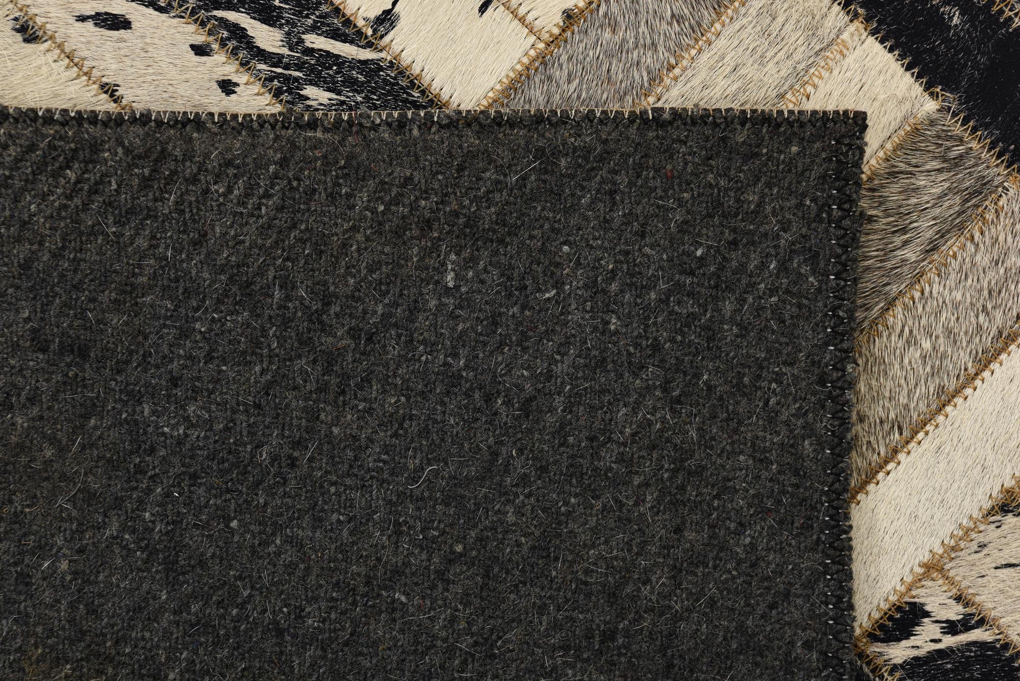 2' 1 x 3' 1 Cowhide Rug