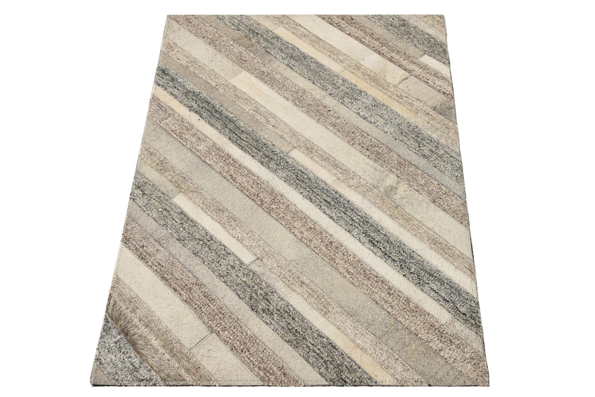 2' 1 x 3' 1 Cowhide Rug