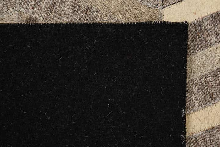 2' 1 x 3' 1 Cowhide Rug