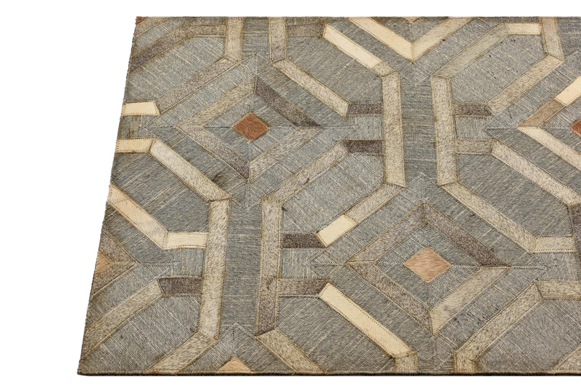 2' 3 x 3' 1 Cowhide Rug