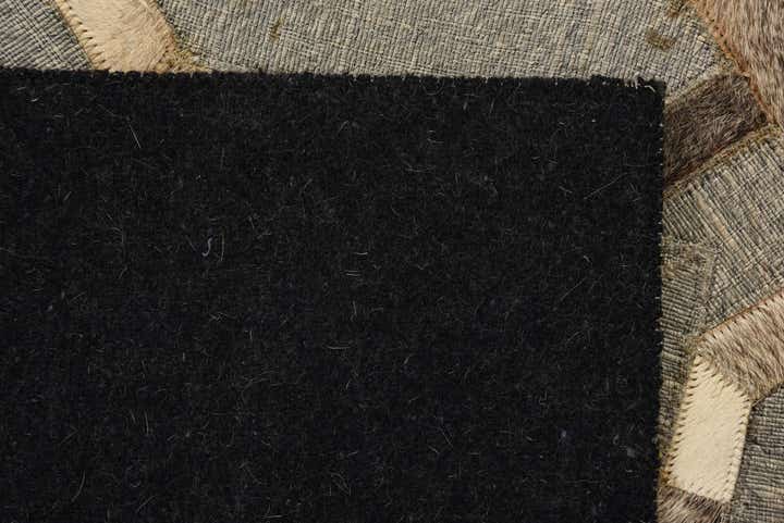 2' 3 x 3' 1 Cowhide Rug